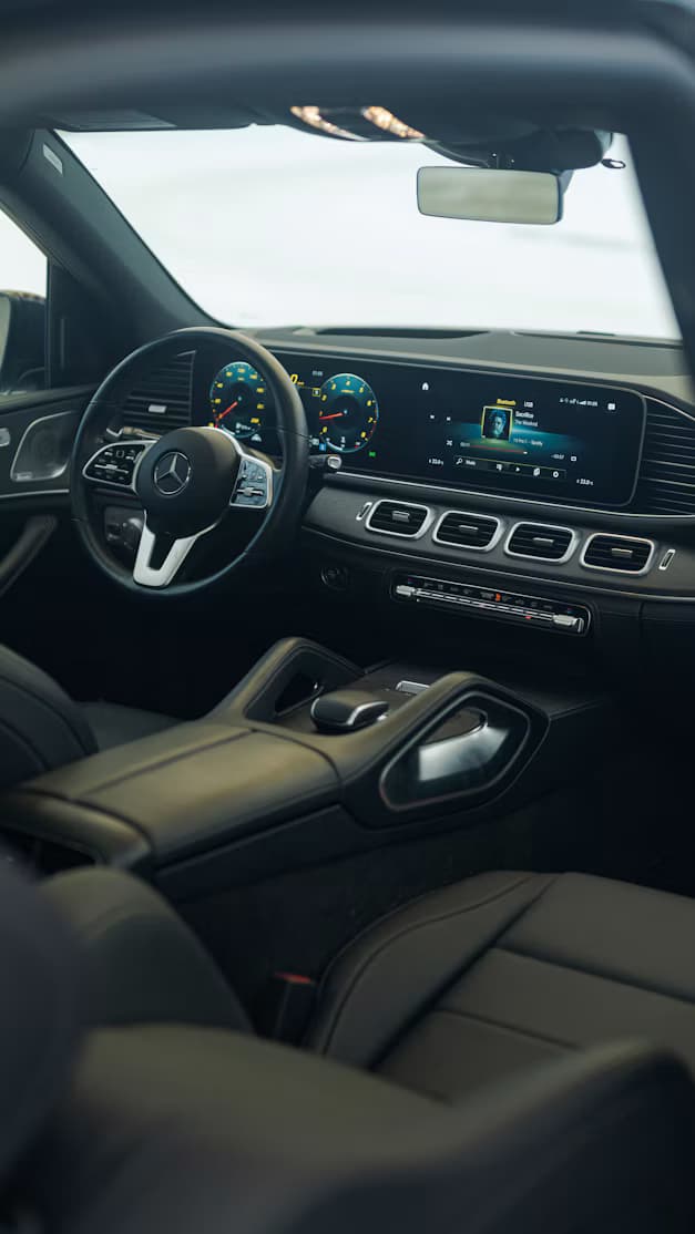 The leather interior and dashboard of a luxury vehicle