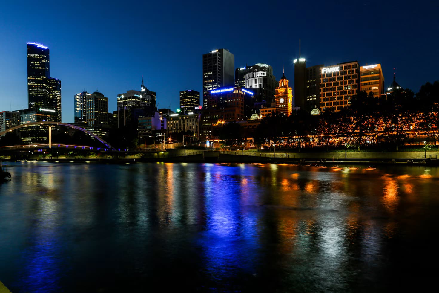 The Melbourne skyline reflected in the Yarra River at night